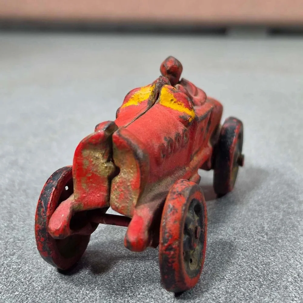 Antique Hubley Cast Iron Boat-tail Race Car Toy Driver 1920's.